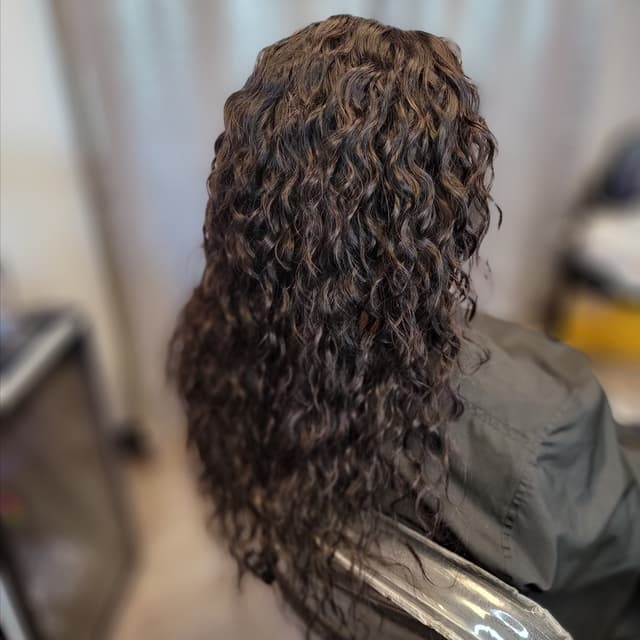 12" Curly Crown Experience Sew-In at Glam Dollz Studio LLC in Orlando, FL